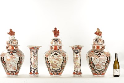 Lot 549 - A SUITE OF FIVE 18TH CENTURY JAPANESE EDO PERIOD IMARI VASES