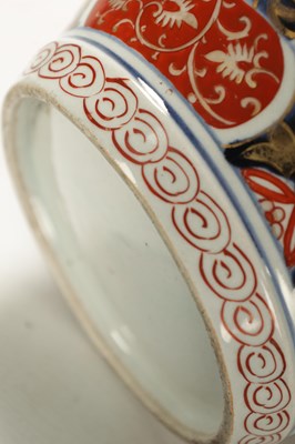 Lot 549 - A SUITE OF FIVE 18TH CENTURY JAPANESE EDO PERIOD IMARI VASES