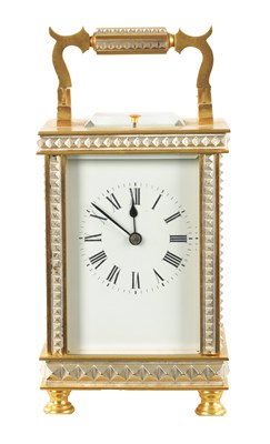 Lot 1229 - A LATE 19TH CENTURY GILT BRASS AND SILVERED REPEATING CARRIAGE CLOCK