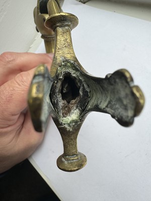 Lot 816 - A 19TH CENTURY INDIAN RAJPUT BRONZE SWORD HILT