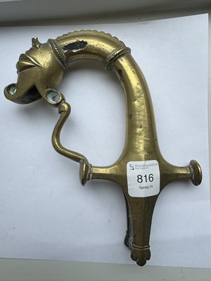 Lot 816 - A 19TH CENTURY INDIAN RAJPUT BRONZE SWORD HILT