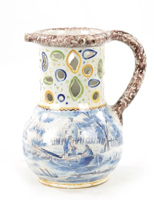 Lot 484 - AN 18TH CENTURY DUTCH DELFTWARE PUZZLE JUG