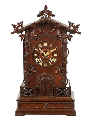Lot 1201 - A LARGE LATE 19TH CENTURY BLACK FOREST TRUMPETER CLOCK