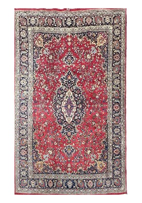 Lot 1460 - A LARGE EASTERN RUG