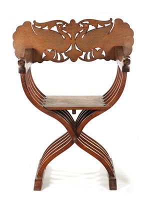 Lot 584 - A 19TH CENTURY INDIAN HARDWOOD AND BRASS INLAID FOLDING SAVONAROLA ARMCHAIR
