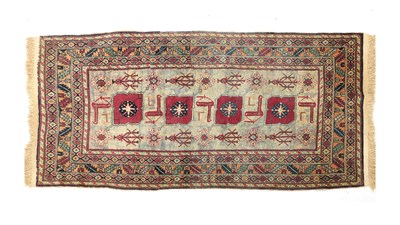 Lot 1376 - AN ANTIQUE AFGHAN / EASTERN RUG