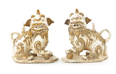 Lot 495 - A PAIR OF 19TH CENTURY CHINESE CERAMIC FOO DOGS