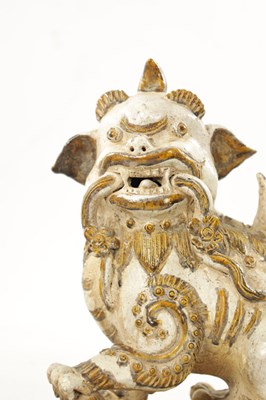 Lot 495 - A PAIR OF 19TH CENTURY CHINESE CERAMIC FOO DOGS