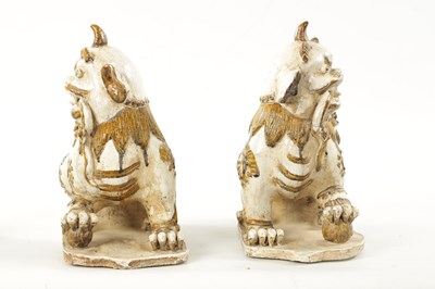 Lot 495 - A PAIR OF 19TH CENTURY CHINESE CERAMIC FOO DOGS