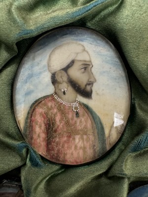 Lot 276 - A CASE GROUP OF NINETEEN PAINTED IVORY MINIATURE PORTRAITS OF THE INDIAN MAHARAJA OF PUNJAB