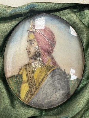 Lot 276 - A CASE GROUP OF NINETEEN PAINTED IVORY MINIATURE PORTRAITS OF THE INDIAN MAHARAJA OF PUNJAB
