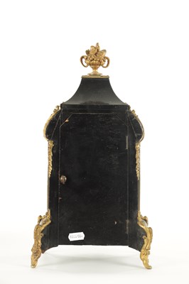 Lot 1050 - A LATE 19TH CENTURY FRENCH BOULLE SWINGING CHERUB MANTEL CLOCK