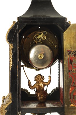 Lot 1050 - A LATE 19TH CENTURY FRENCH BOULLE SWINGING CHERUB MANTEL CLOCK