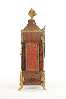 Lot 1050 - A LATE 19TH CENTURY FRENCH BOULLE SWINGING CHERUB MANTEL CLOCK
