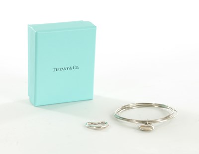 Lot 351 - A TIFFANY & CO .925 STERLING SILVER TRIPLE STRAND BRACELET
