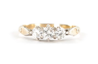 Lot 298 - AN 18CT GOLD THREE STONE DIAMOND RING