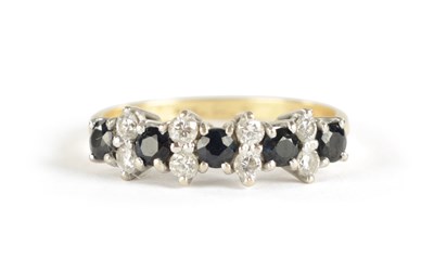 Lot 302 - AN 18CT GOLD SAPPHIRE AND DIAMOND RING