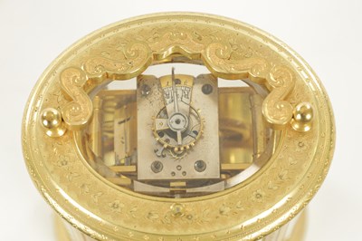 Lot 1028 - A LATE 19TH CENTURY FRENCH ENGRAVED OVAL CASED REPEATING CARRIAGE CLOCK
