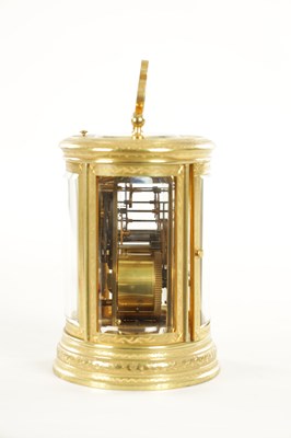 Lot 1028 - A LATE 19TH CENTURY FRENCH ENGRAVED OVAL CASED REPEATING CARRIAGE CLOCK