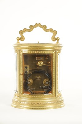Lot 1028 - A LATE 19TH CENTURY FRENCH ENGRAVED OVAL CASED REPEATING CARRIAGE CLOCK