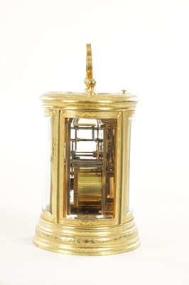Lot 1028 - A LATE 19TH CENTURY FRENCH ENGRAVED OVAL CASED REPEATING CARRIAGE CLOCK