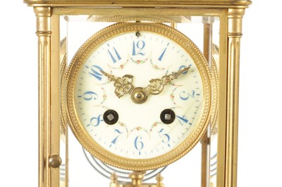 Lot 1090 - A LATE 19TH CENTURY GILT BRASS FOUR GLASS MANTEL CLOCK