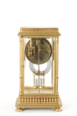 Lot 1090 - A LATE 19TH CENTURY GILT BRASS FOUR GLASS MANTEL CLOCK