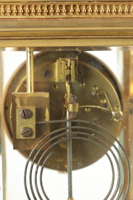 Lot 1090 - A LATE 19TH CENTURY GILT BRASS FOUR GLASS MANTEL CLOCK