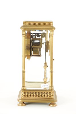 Lot 1090 - A LATE 19TH CENTURY GILT BRASS FOUR GLASS MANTEL CLOCK