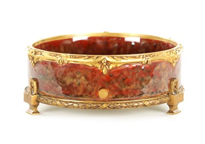 Lot 89 - LOUCHET A PARIS - A FRENCH ART NOUVEAU ORMOLU MOUNTED STONEWARE SHALLOW BOWL