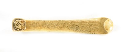 Lot 208 - AN EARLY EASTERN BONE BELT HOOK
