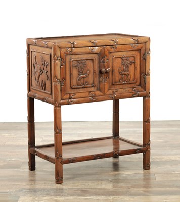 Lot 267 - A CHINESE-CARVED HARDWOOD BEDSIDE CABINET