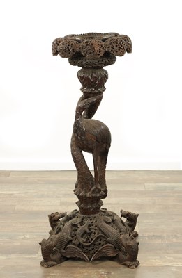 Lot 179 - A 19TH CENTURY ANGLO INDIAN CARVED HARDWOOD JARDINIERE STAND