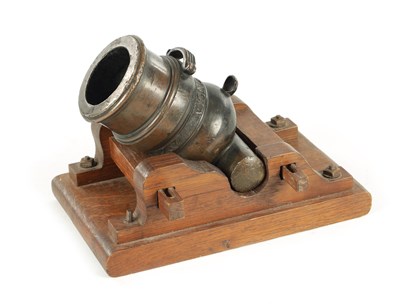 Lot 619 - AN 18TH CENTURY BRONZE MINIATURE MORTAR CANNON ON LATER STAND