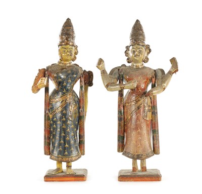 Lot 226 - A PAIR OF 19TH CENTURY POLYCHROME DECORATED INDIAN TEMPLE FIGURES