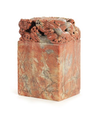 Lot 140 - A LARGE CHINESE CARVED ROUGE SOAPSTONE SEAL