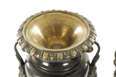 Lot 1134 - A 19TH CENTURY FRENCH SLATE AND ORMOLU MOUNTED THREE-PIECE CLOCK GARNITURE