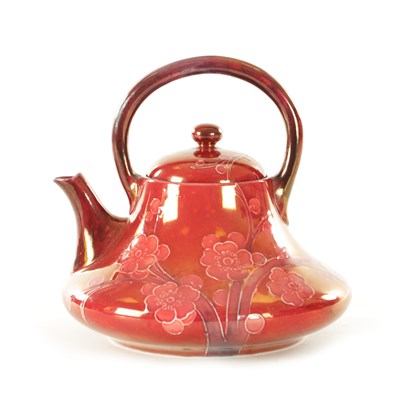 Lot 33 - AN EARLY 20TH CENTURY MOORCROFT POTTERY PRUNUS PATTERN RUBY LUSTRE TEAPOT