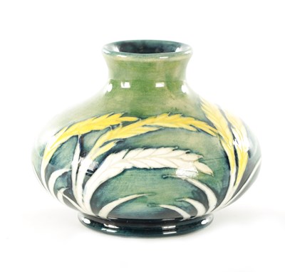 Lot 29 - A WILLIAM MOORCROFT 'WAVING CORN' PATTERN MINIATURE SQUAT VASE