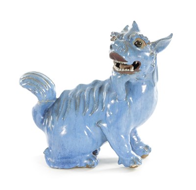 Lot 127 - A 19TH CENTURY CHINESE BLUE GLAZED SEATED FOO DOG