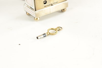 Lot 1108 - AN EARLY 20TH CENTURY CASED MINIATURE SWISS SILVER AND GUILLOCHE ENAMELLED BOUDOIR ALARM CLOCK