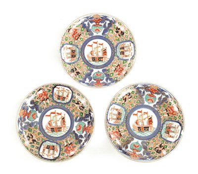 Lot 111 - THREE MEIJI PERIOD JAPANESE BLACK SHIP IMARI PLATES