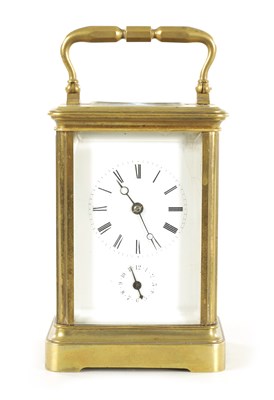 Lot 1572 - A LATE 19TH CENTURY BRASS STRIKING CARRIAGE CLOCK