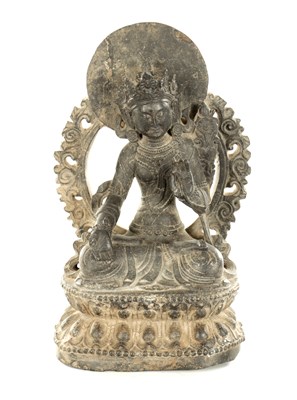 Lot 128 - A GOOD 17TH/18TH CENTURY CARVED STONE TIBETAN BUDDHA