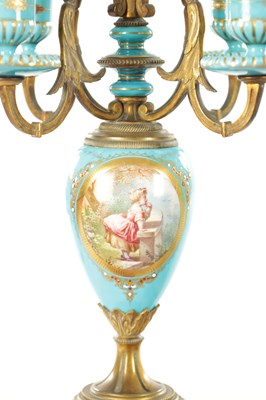 Lot 1106 - A 19TH CENTURY SERVES STYLE FRENCH PORCELAIN AND ORMOLU THREE-PIECE CLOCK GARNITURE
