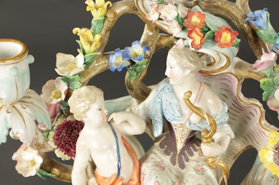 Lot 108 - A 19TH CENTURY MEISSEN THREE BRANCH FIGURAL CANDELABRA