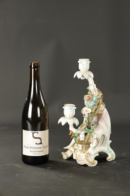 Lot 108 - A 19TH CENTURY MEISSEN THREE BRANCH FIGURAL CANDELABRA