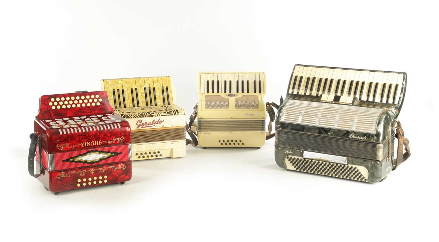Lot 693 - A COLLECTION OF FOUR CASED ACCORDIONS