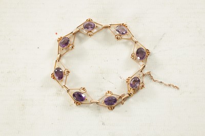 Lot 464 - A VINTAGE 9CT GOLD AMETHYST BRACELET