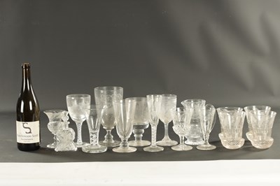 Lot 18 - A SET OF FOUR ENGRAVED AND CUT LEMONADE GLASSES